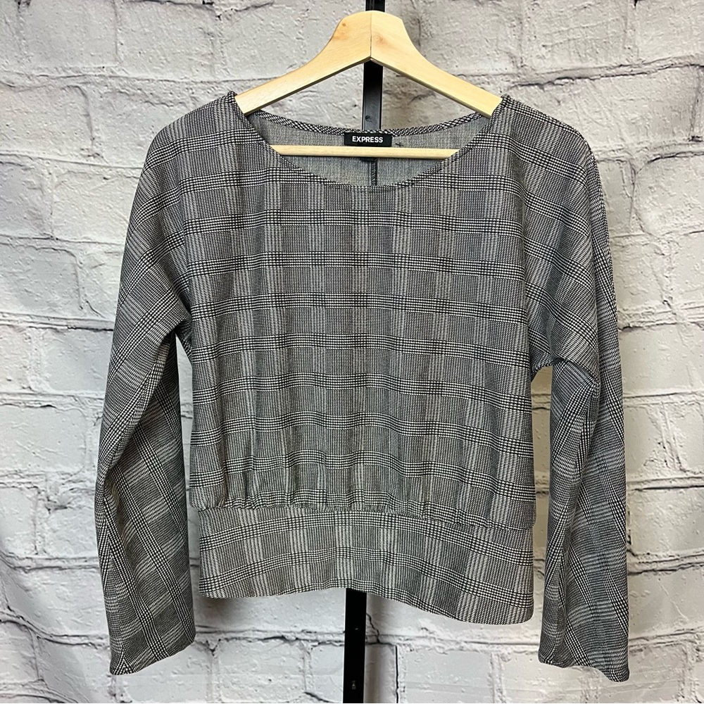 Express plaid long sleeve shirt. Black and white.  Slight synch on back